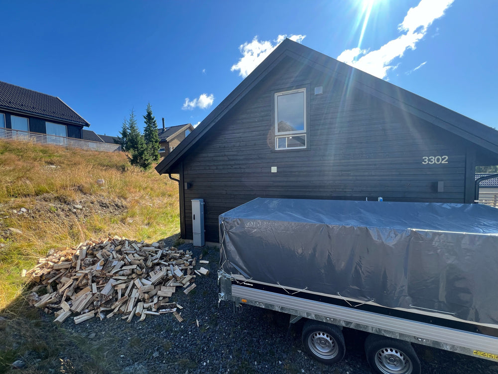 2000 liter tørr bjørkeved levert til hytta (2 x 1000 liter bur)